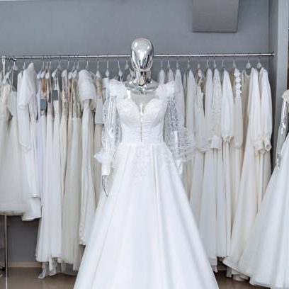 boutique wedding dress on mannequin in bridal store. Fashion concept